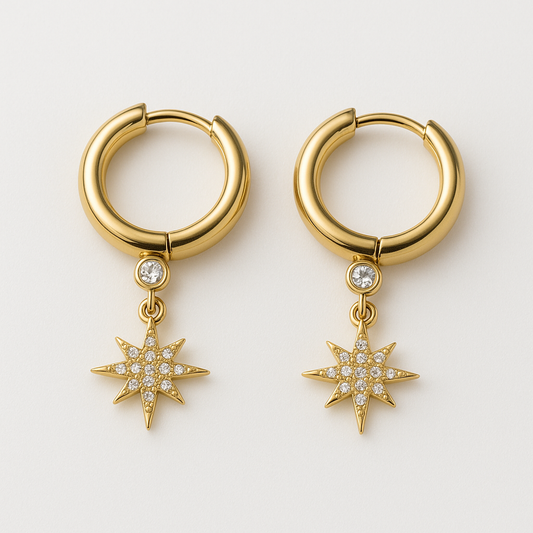 Boucles d'oreilles Stella en acier inoxydable doré avec pendentif étoilé serti de zircons, bijou élégant et lumineux, hypoallergénique et résistant à l'eau.