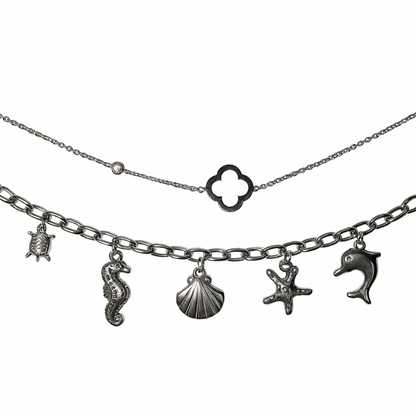 Bracelets argentés en acier inoxydable avec charms marins — tortue, hippocampe, coquillage, étoile de mer et dauphin — bijoux tendance pour femme.