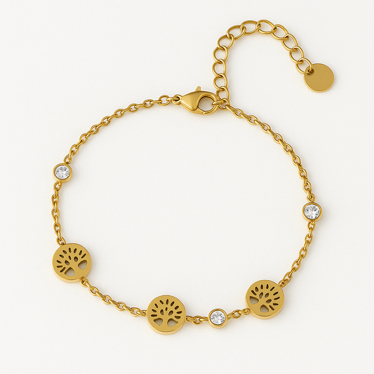 Bracelet Arbre de Vie en acier inoxydable doré avec médaillons découpés et cristaux brillants, bijou élégant et raffiné, hypoallergénique et résistant à l'eau.