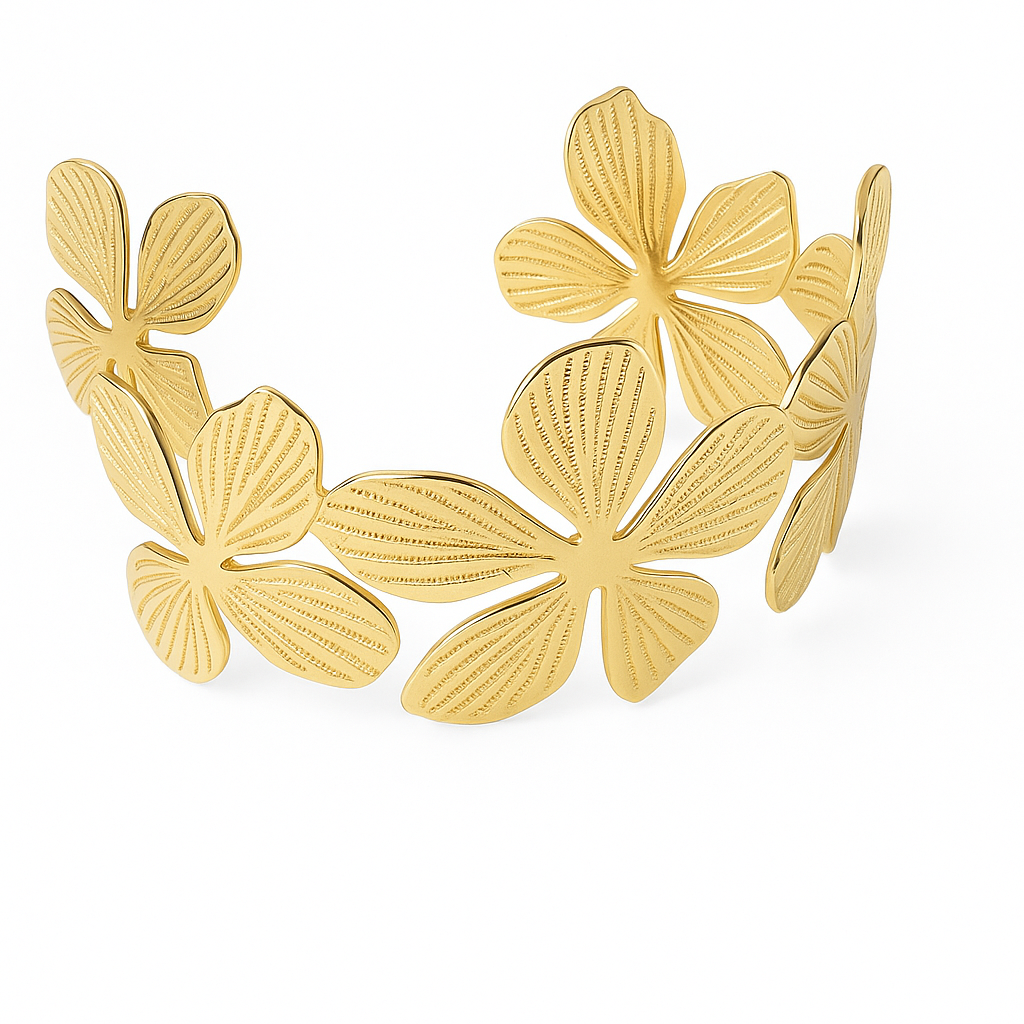 Bracelet Manchette Fleur Dorée rigide à motifs floraux ajourés, bijou doré féminin et raffiné pour femme.