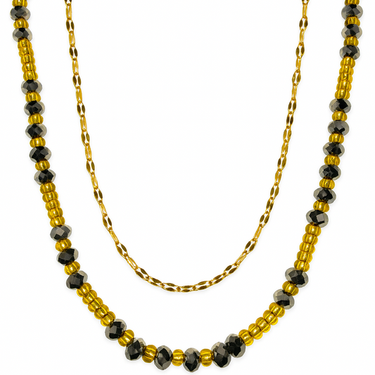 Collier Nero Doré à double rang avec perles noires facettées et perles dorées, bijou élégant et chic pour femme.