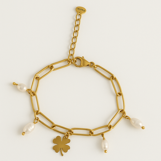 Bracelet trèfle porte-bonheur et perles en acier inoxydable doré, bijou élégant et raffiné, hypoallergénique et résistant à l'eau.